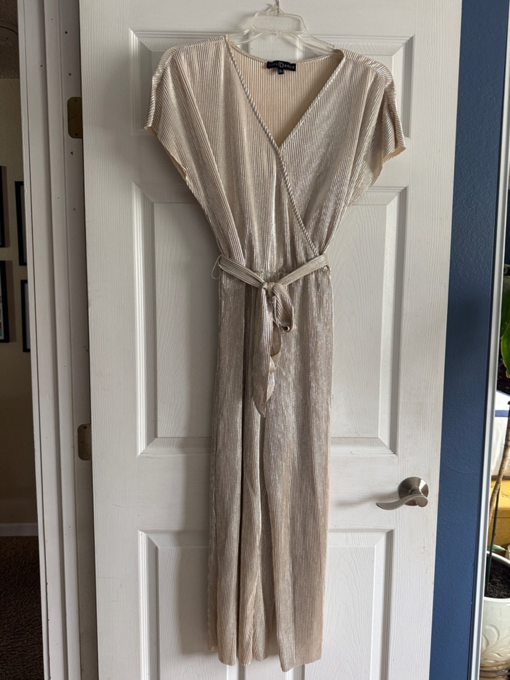 Fred David belted gold jumpsuit, elastic waist, single button front closure.